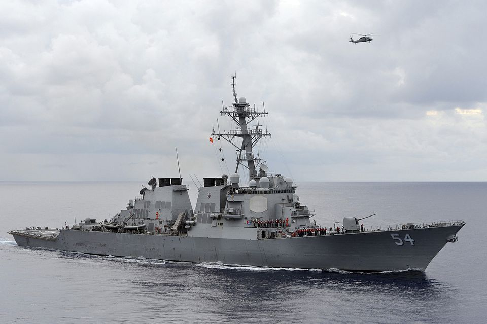The U.S. Navy guided-missile destroyer USS Curtis Wilbur patrols in the Philippine Sea in this August 15, 2013 file photo. REUTERS/U.S. Navy/Mass Communication Specialist 3rd Class Declan Barnes/Handout via Reuters/Files