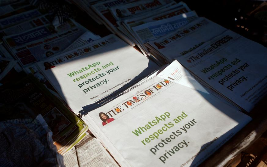 A WhatsApp advertisement is seen on the front pages of newspapers at a stall in Mumbai, India, January 13, 2021. (Photo: CNN) 