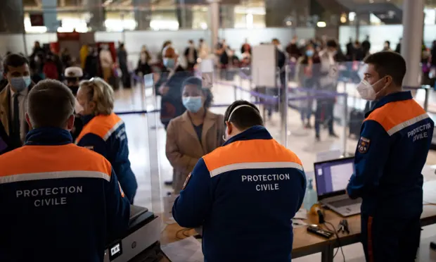 Passengers arriving at Roissy Charles de Gaulle airport near Paris in April. From Tuesday, a system will be ready to allow member states to issue a digital Covid passport to citizens proving their status and freeing them up to travel. Photograph: Ian Langsdon/AFP/Getty Images