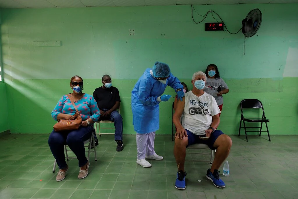 People receiving Pfizer’s Covid-19 vaccine last month in San Miguelito, Panama. Photo: Shutterstock 