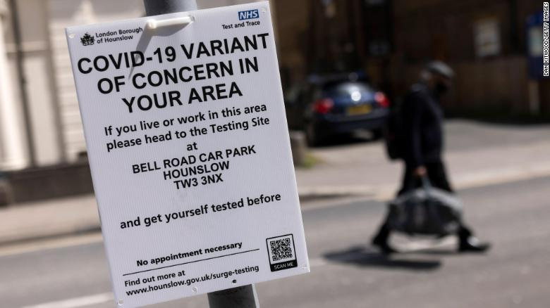 A sign directing people to vaccination center in west London. Photo: CNN 