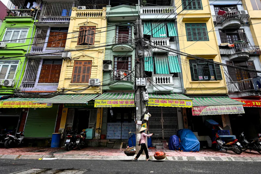 One tube house can be the  home for 3 – 4 people. However, two or three generations can still grow up within this narrow space.   Photo: Manan Vatsyayana