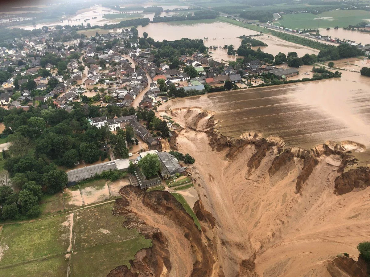 Flooding has led to the collapse of an entire field in Rhein-Erft-Kreis, a district in western Germany. Officials have said a warming climate is at least partially to blame for floods. Rhein-Erft-Kreis District/Storyful