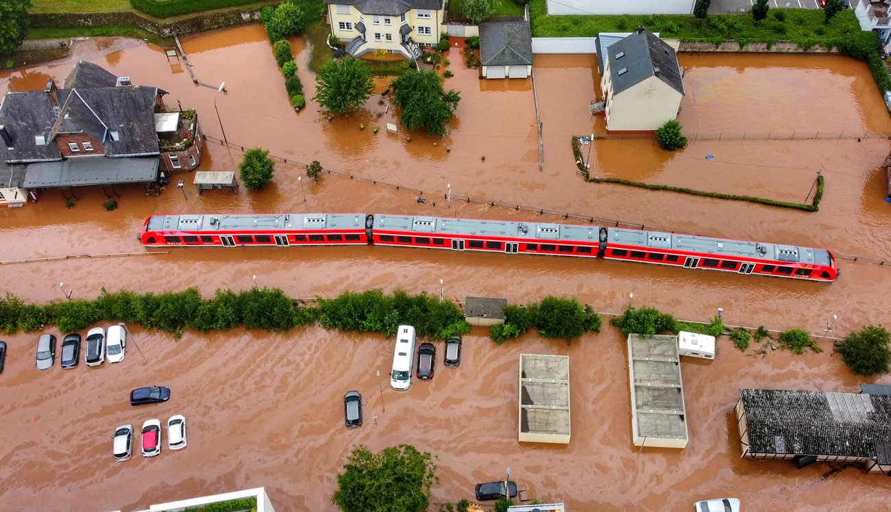 A regional train is stuck in floodwaters at a station in Kordel, Germany. Power went out, and the train came to a halt on Wednesday. Sebastian Schmitt/Picture Alliance/Getty Images