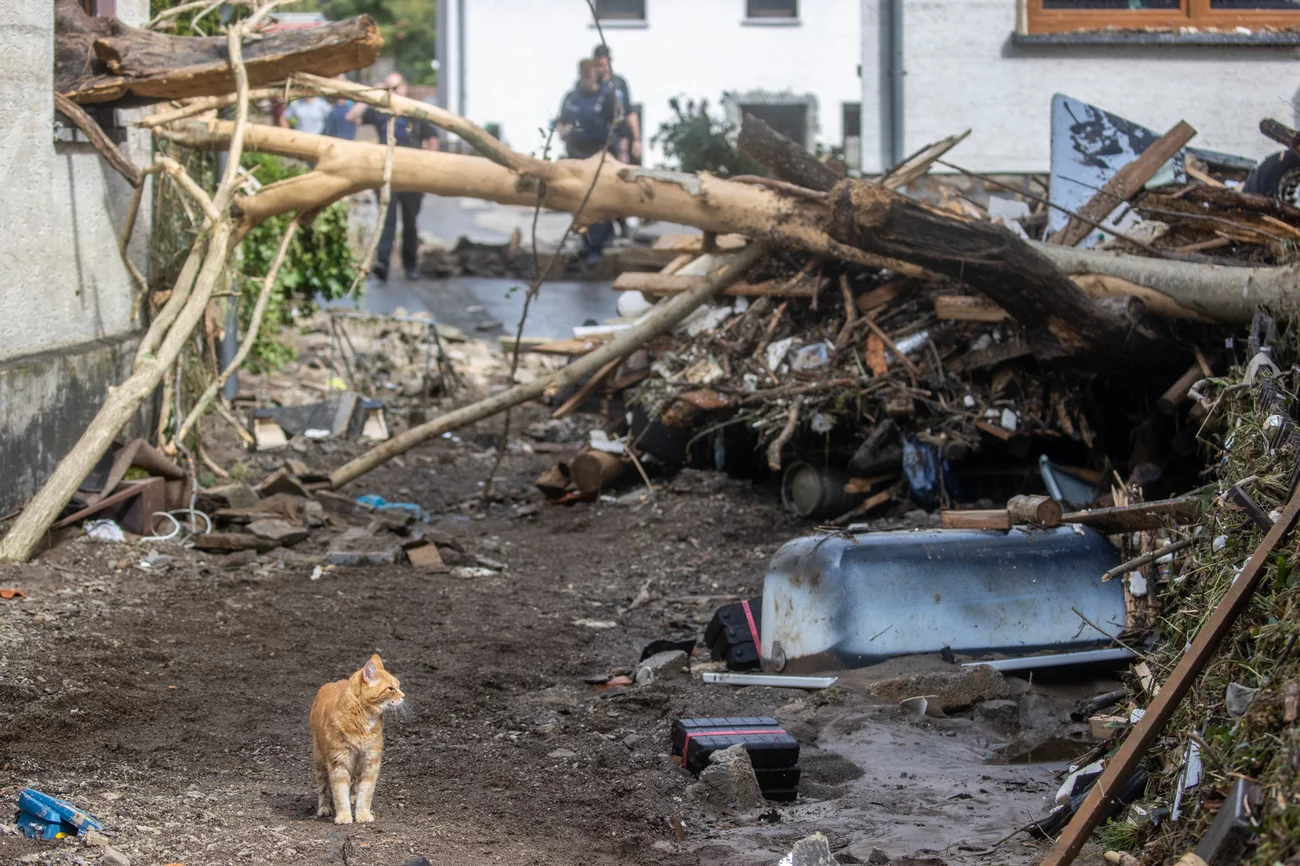 Debris lies in front of a house Thursday in Schuld in western Germany. Christoph Reichwein/Picture Alliance/Getty Images