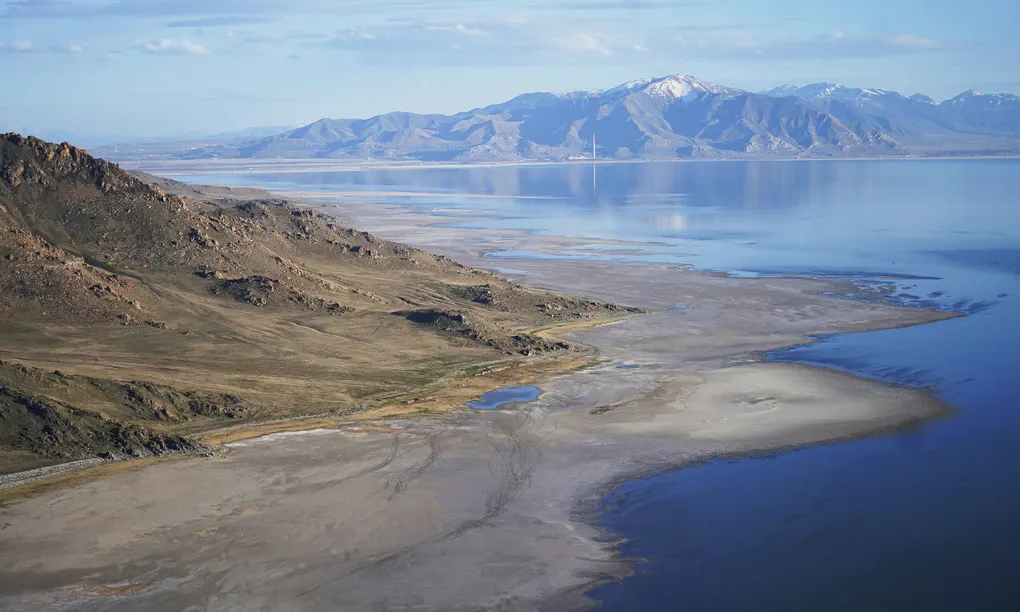 The Great Salt Lake recedes from Anthelope Island in May. Photograph: Rick Bowmer/AP