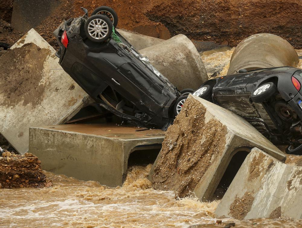 Cars lie in a washed out part of the Bessem district of Erftstadt, Germany, Friday, July 16, 2021. Photo: AP 