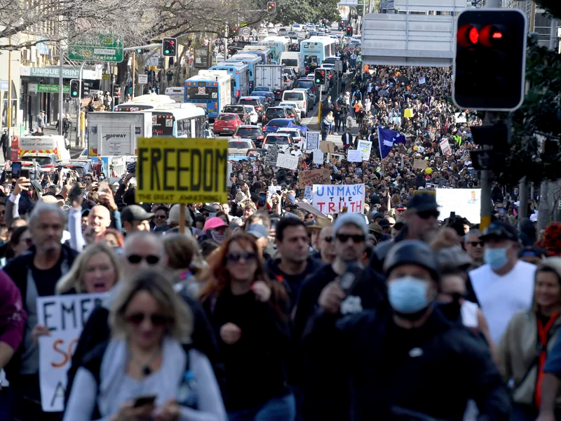 Protesters march through the streets in Sydney on Saturday. Mick Tsikas/AP