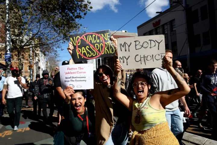 Protesters march down George St on July 24, 2021 in Sydney, Australia. Photo: Getty Images 