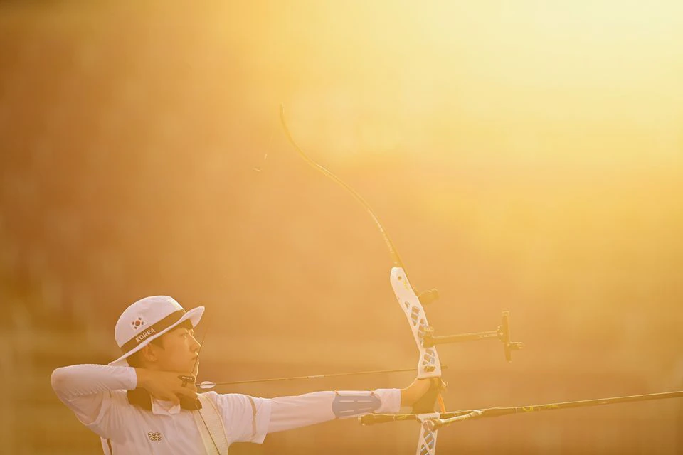 Tokyo 2020 Olympics - Archery - Women's Individual - 1/32 Finals - Yumenoshima Archery Field, Tokyo, Japan - July 29, 2021. An San of South Korea in action REUTERS/Clodagh Kilcoyne