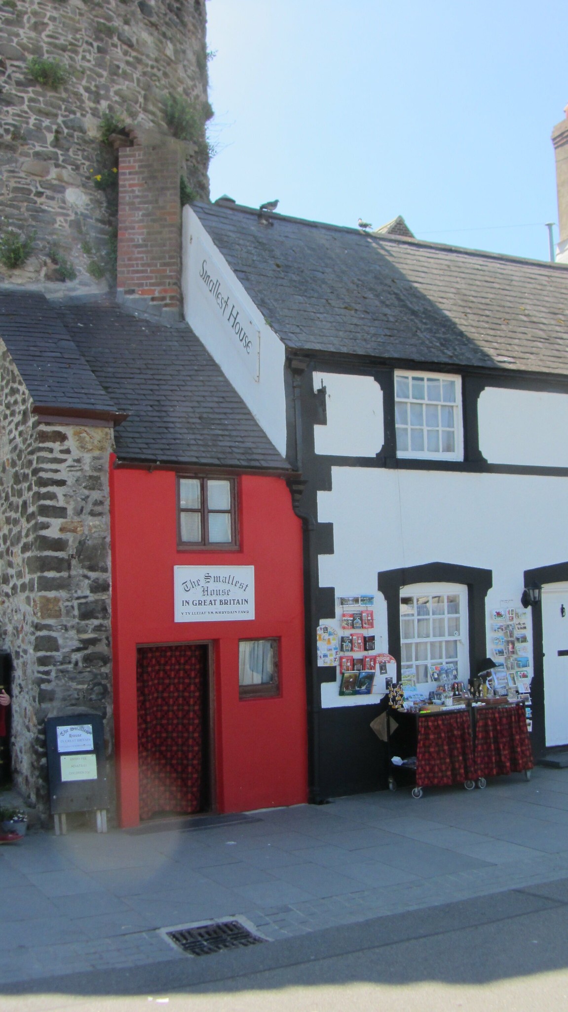 The petit red house becomes a highlight of the street. Photo: Unusual Places