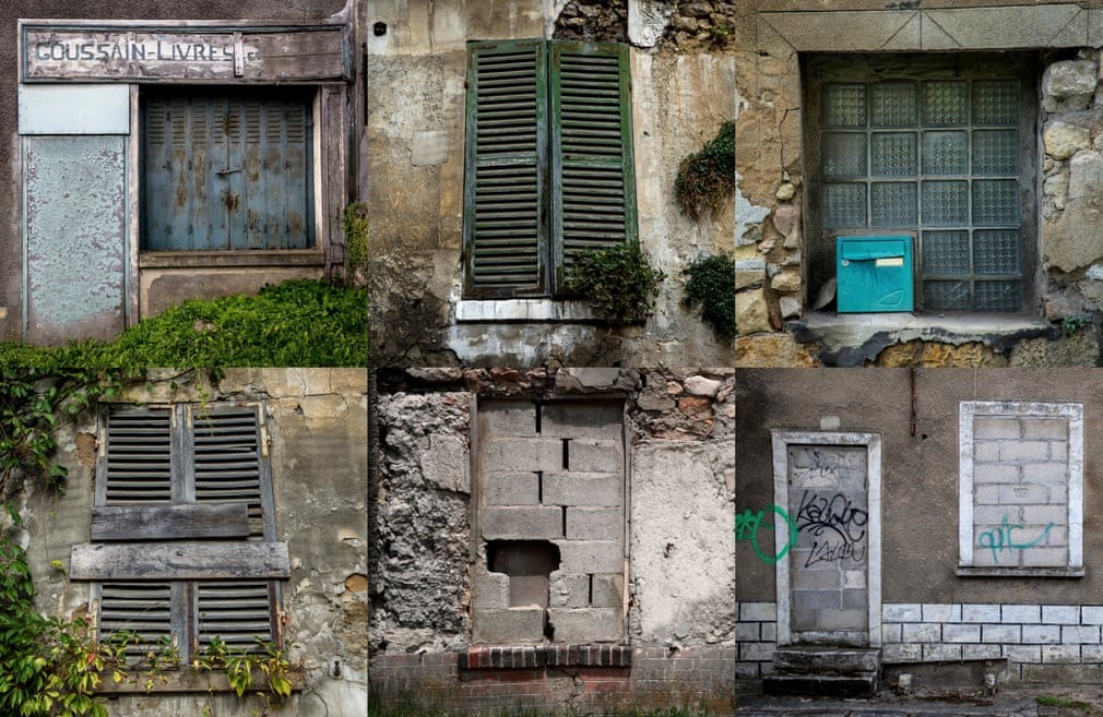 Doors and windows of abandoned houses. Photograph: Christophe Petit-Tesson/EPA