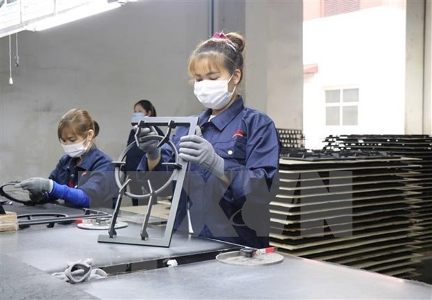 Production at a factory of Vietnam Bright International Co., Ltd. in Bac Ninh's Thuan Thanh II Industrial Park. (Photo: VNA)