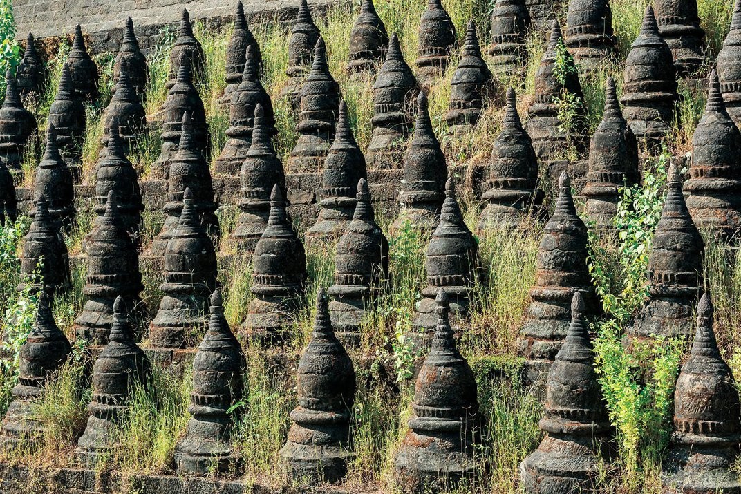 On the terraces of the Kothaung temple, an elaborate array of miniature stupas, or dome-shaped shrines, replicate the structure’s signature architectural feature. Universal Images Group North America LLC / Alamy
