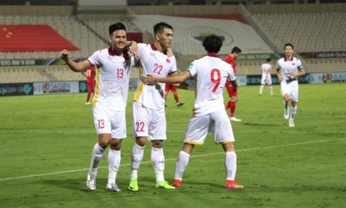 Ho Tan Tai (number 13) celebrates after scoring a goal in the World Cup qualifying clash between China and Vietnam on October 8, 2021. Photo: VnExpress