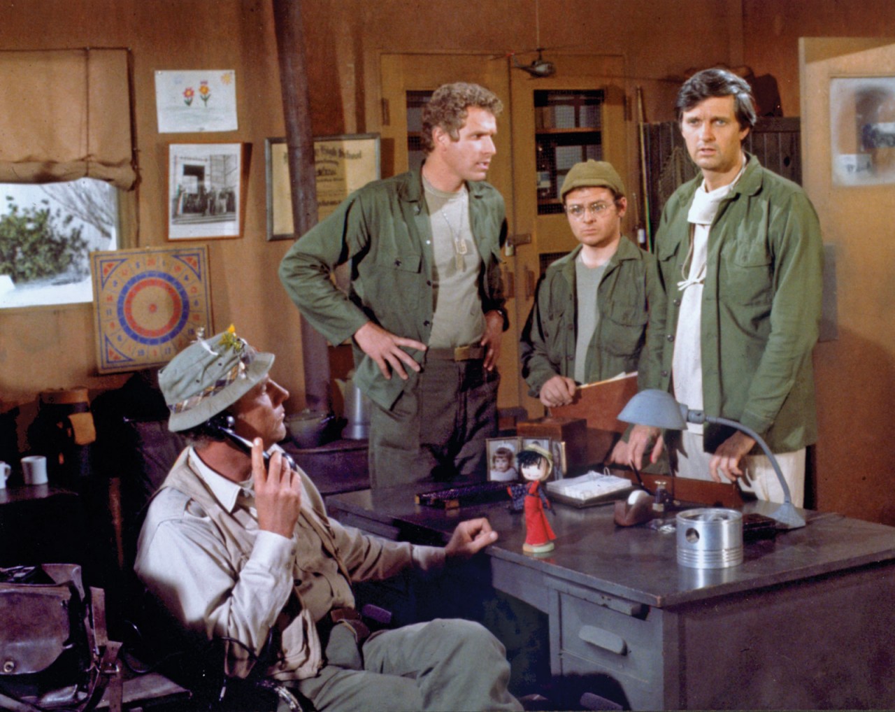 (From left) Actors McLean Stevenson, Wayne Rogers, Gary Burghoff, and Alan Alda in a scene from the television series M*A*S*H. © Columbia Broadcasting System