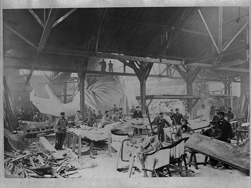 Workmen constructing the Statue of Liberty in Bartholdi's Parisian warehouse workshop in the winter of 1882. Albert Fernique/U.S. Library of Congress