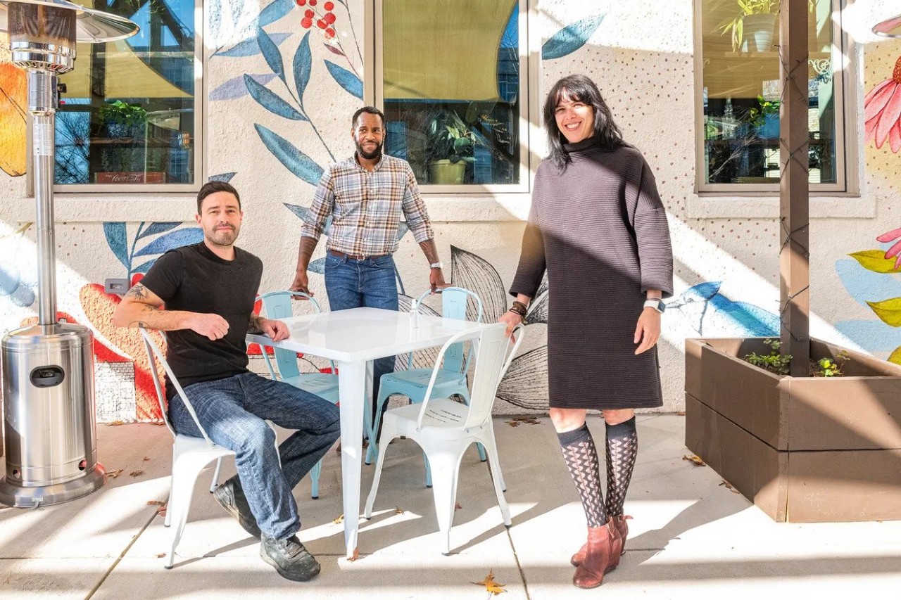 Pennyroyal Station partners Jesse Miller, Garrick Lumsden, and Erin Edwards on its patio. Rey Lopez/Eater DC