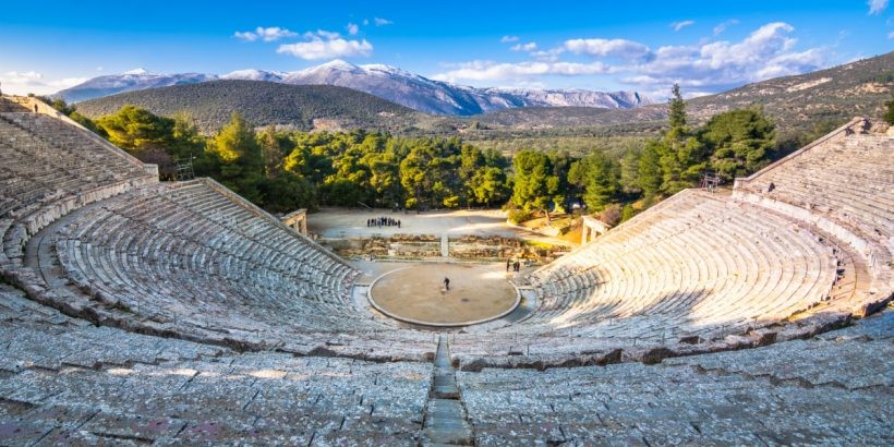 Photo: Epidaurus, in ancient Greece, important commercial centre on the eastern coast of the Argolid in the northeastern Peloponnese; it is famed for its 4th-century-BCE temple of Asclepius, the god of healing. Excavations of the sacred precinct reveal that it contained temples to Asclepius and Artemis, a theatre, stadium, gymnasiums, baths, a tholos, a hospital, and an abaton, an area where patients slept. Inscriptions record divine medical cures. Originally Ionic, Epidaurus became Doric under the influence of Argos, to which it owed religious allegiance; politically it remained independent.  The Ancient Theatre of Epidaurus is regarded as the best preserved ancient theatre in Greece in terms of its perfect acoustics and fine structure. It was constructed in the late 4th century BC and it was finalized in two stages. Originally the theatre had 34 rows of seats divided into 34 blocks by stairs and walkways. The Ancient Theatre of Epidaurus is a theatre in the Greek city of Epidaurus, located on the southeast end of the sanctuary dedicated to the ancient Greek God of medicine, Asclepius. It is built on the west side of Cynortion Mountain, near modern Lygourio, and belongs to the Epidaurus Municipality. It is considered to be the most perfect ancient Greek theatre with regard to acoustics and aesthetics. A Brief History of Epidaurus Built in 340 BC, the theater seats about 13,000 spectators. It was built in two phases – one during the 4th century BC and the second in the mid-2nd century – and divided into two parts: one for citizens and one for priests and authorities, according to Culture Trip.  In use for several centuries, the theater was destroyed in 395 AD as the Goths invaded the Peloponnese. Later in 426 AD, Theodosius II closed the Sanctuary, banning all pagan activities throughout Greece, while the site was permanently out of order following a series of earthquakes. The impressive monument remained covered until 1881 when excavations took place under the guidance of the Greek Archaeological Society. And while their work found that the stage-building no longer existed, they uncovered the auditorium, which was still in good condition. The news quickly got around, attracting the attention of the general public.  The discovery of the ancient theater was closely linked to the persistent demands to use ancient facilities for cultural and commercial purposes. And so in 1907, repairs were made to the western aisle and retaining wall. Restoration resumed soon after WWII and focused on making the monument safe and suitable for performances. Since 1938, hundreds of theatrical plays have been performed, and in 1954, the famous Epidaurus Festival, now called the Athens-Epidaurus Festival, was launched. Held every summer, the event features both acclaimed dramas from the past and contemporary plays that are performed not only in Athens but also the ancient theater. Throughout the years, the festival has gained popularity in Greece and abroad. How big is the Epidaurus Theater? The theater consists of the circular orchestra, the place where the actors and the dance played, and the 'koilon', the semicircular part around the orchestra -named after the dance that sang and danced- where the seats for the spectators are located. The 'koilon' is divided into two moldings, the upper with 21 rows of seats for the people and the lower with 34 rows of seats for priests and lords. The orchestra has a diameter of 20 meters and is surrounded by a special underground sewer, 1.99m wide to remove rainwater flowing from the 'koilon', according to Geeking.me.  A lot has been said and written about the supreme form of art of ancient Greek theater over the centuries, but one thing is for sure: ancient drama touches your soul, teaching you invaluable lessons for human nature. So, if you consider yourself a theater lover, visiting is the ancient theater of Epidauros isn’t optional, it’s mandatory for your cultural health. A treat for both body and soul. The magical and amazing acoustics of Epidaurus theatre Researchers at the Georgia Institute of Technology have pinpointed the elusive factor that makes the ancient amphitheater an acoustic marvel. It’s not the slope, or the wind — it’s the seats. The rows of limestone seats at Epidaurus form an efficient acoustics filter that hushes low-frequency background noises like the murmur of a crowd and reflects the high-frequency noises of the performers on stage off the seats and back toward the seated audience member, carrying an actor’s voice all the way to the back rows of the theater. The research, done by acoustician and ultrasonics expert Nico Declercq, an assistant professor in the Woodruff School of Mechanical Engineering at Georgia Tech and Georgia Tech Lorraine in France, and Cindy Dekeyser, an engineer who is fascinated by the history of ancient Greece, appears in the April issue of the Journal of the Acoustics Society of America, according to ScienceDaily.  While many experts speculated on the possible causes for Epidaurus’ acoustics, few guessed that the seats themselves were the secret of its acoustics success. There were theories that the site’s wind — which blows primarily from the stage to the audience — was the cause, while others credited masks that may have acted as primitive loudspeakers or the rhythm of Greek speech. Other more technical theories took into account the slope of the seat rows. When Declercq set out to solve the acoustic mystery, he too had the wrong idea about how Epidaurus carries performance sounds so well. He suspected that the corrugated, or ridged, material of the theater’s limestone structure was acting as a filter for sound waves at certain frequencies, but he didn’t anticipate how well it was controlling background noise. “When I first tackled this problem, I thought that the effect of the splendid acoustics was due to surface waves climbing the theater with almost no damping,” Declercq said. “While the voices of the performers were being carried, I didn’t anticipate that the low frequencies of speech were also filtered out to some extent.” But as Declercq’s team experimented with ultrasonic waves and numerical simulations of the theater’s acoustics, they discovered that frequencies up to 500 Hz were held back while frequencies above 500 Hz were allowed to ring out. The corrugated surface of the seats was creating an effect similar to the ridged acoustics padding on walls or insulation in a parking garage. So, how did the audience hear the lower frequencies of an actor’s voice if they were being suppressed with other background low frequencies? There’s a simple answer, said Declercq. The human brain is capable of reconstructing the missing frequencies through a phenomenon called virtual pitch. Virtual pitch helps us appreciate the incomplete sound coming from small loudspeakers (in a laptop or a telephone), even though the low (bass) frequencies aren’t generated by a small speaker. The Greeks’ misunderstanding about the role the limestone seats played in Epidaurus’ acoustics likely kept them from being able to duplicate the effect. Later theaters included different bench and seat materials, including wood, which may have played a large role in the gradual abandonment of Epidaurus’ design over the years by the Greeks and Romans, Declercq said.