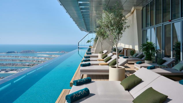 Aura Skypool, which is the world's first and highest 360-degree infinity pool, has opened at Dubai's Palm Tower. AURA Skypool Lounge