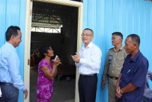 Three families of Vietnamese-Cambodians receive new houses after blaze last year