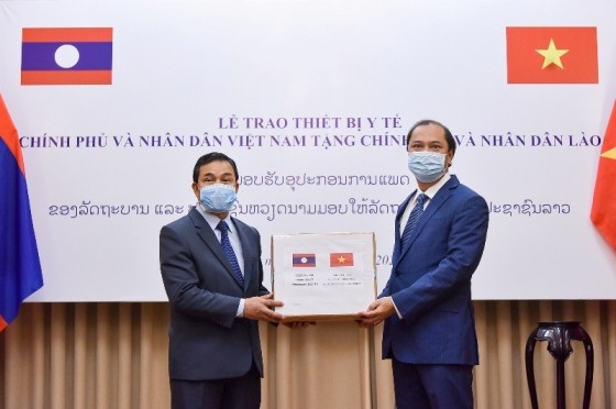 vietnam hands over medical equipment to laos and cambodia for covid 19 combat