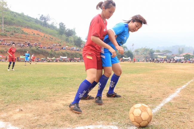 Shaking off social norms with women's football tournament