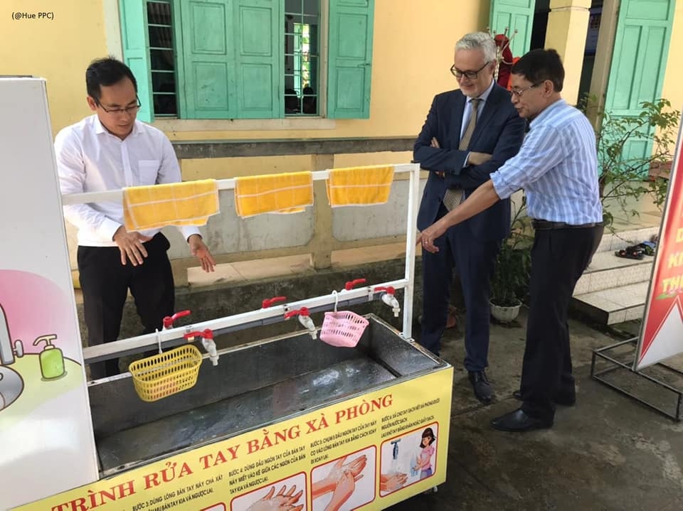 german embassy hands over mobile hand washing station to hues elementary school