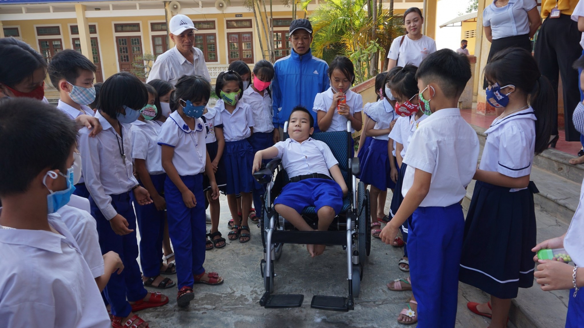 medipeace vietnam presents electric wheelchairs to children in quang tri