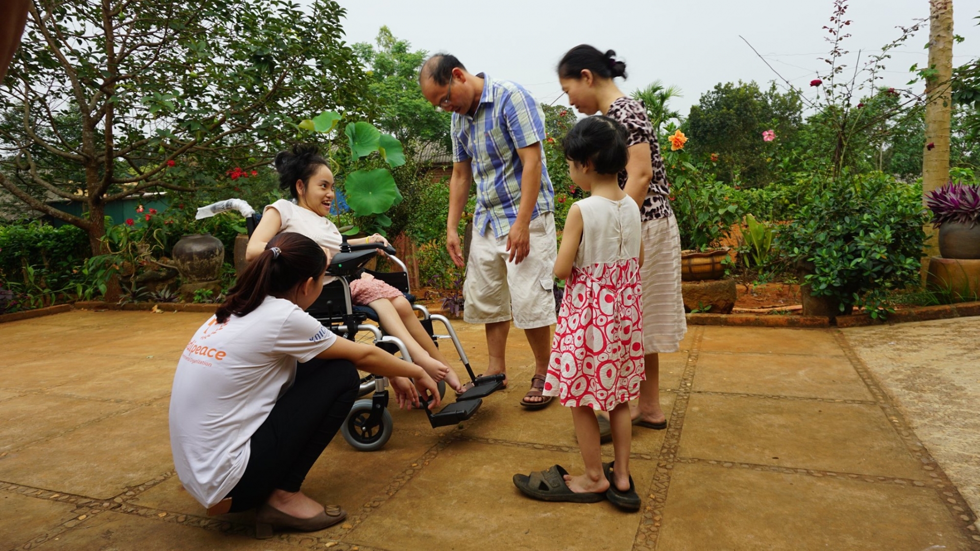 medipeace vietnam presents electric wheelchairs to children in quang tri
