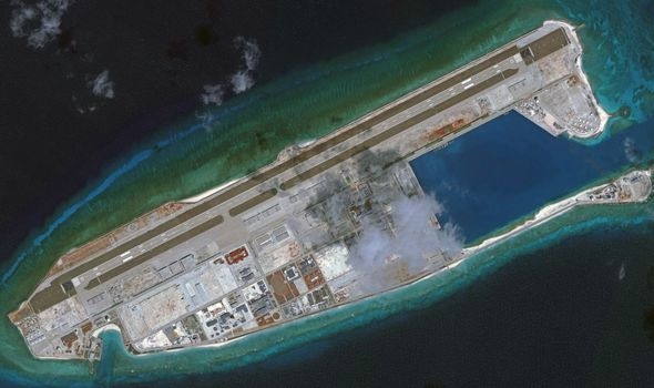 chinese aircraft landing at fiery cross reef vietnam urges parties not to further complicate situation