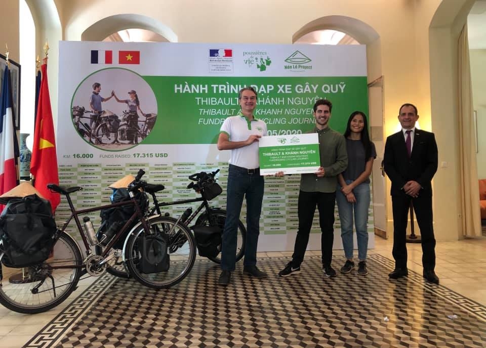vietnamese french couple cycles from europe to asia for needy children
