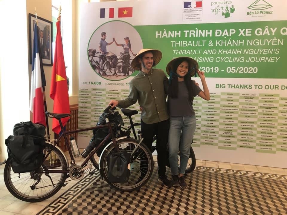 vietnamese french couple cycles from europe to asia for needy children