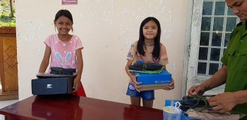 ngo prepares food for quang nams needy families
