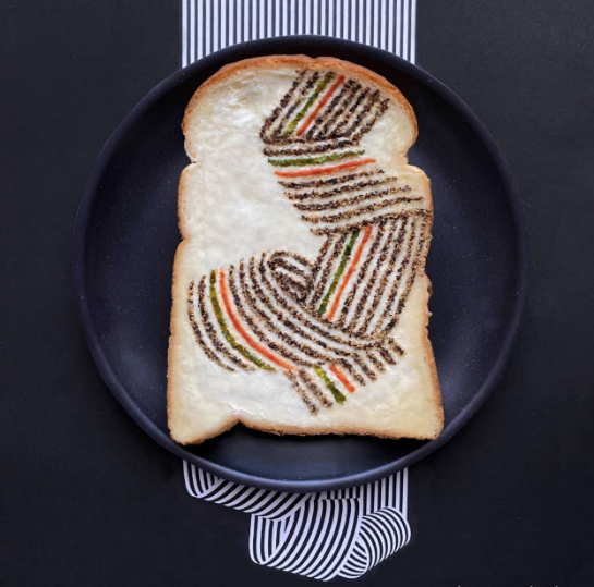 japanese artist makes her creations on plain bread using edible ingredients