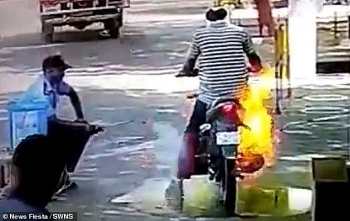 motorcycle catches fire while spraying disinfectant in india