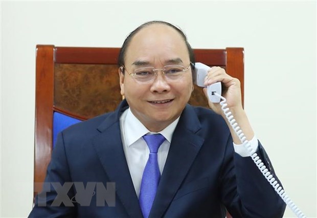 Vietnamese, Malaysian PMs hold phone talk hinh anh 1
