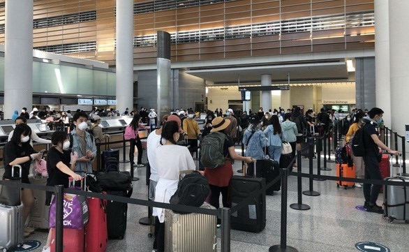 vietnamese citizens fly home from japan us