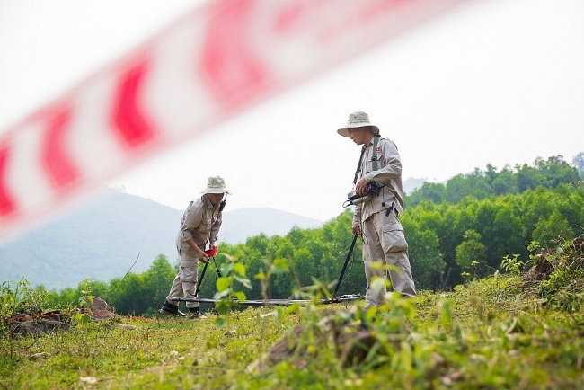 500,000 ha of land being detected and cleared of bombs, mines