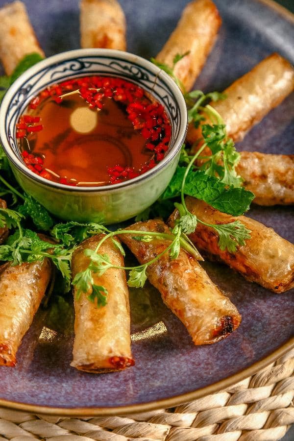 Spring rolls stuffed with noodles, mushrooms, and all manner of other good stuff are fried until crispy.