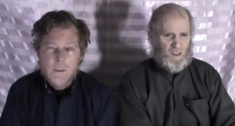 taliban frees two western prisoners