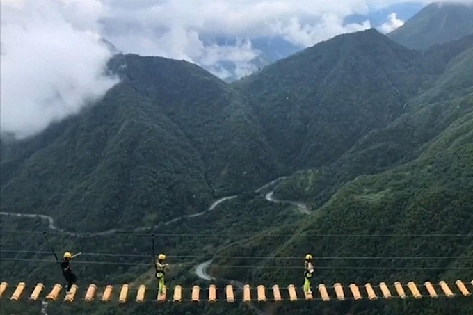 vietnam top destinations exotic suspension bridge on the top of o quy ho pass