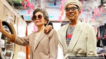 fabulously trendy photos of a stylish senior taiwanese couple at their launderette