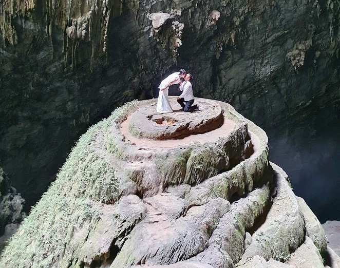 surreal wedding cake photo spot in son doong cave