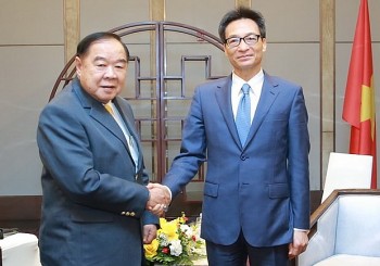 Deputy PM Vu Duc Dam Prawit Welcomes President of the National Olympic Committee of Thailand