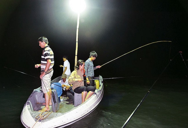 Catching Night Squid off the Coast of Minh Chau Island
