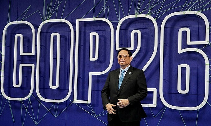 Vietnam Prime Minister Pham Minh Chinh arrives at the opening ceremony of the 2021 U.N. Climate Change Conference, November 1, 2021. Photo by AFP