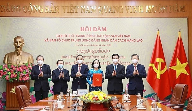 Organisation Commissions of Vietnamese, Lao Parties Further Cooperation