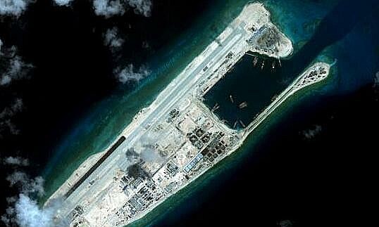 The Fiery Cross Reef on Vietnam’s Truong Sa (Spratly) Archipelago is shown in this handout satellite image dated September 3, 2015 provided by CSIS Asia Maritime Transparency Initiative/Digital Globe. Photo by Reuters