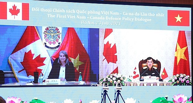 Vietnamese Deputy Minister of National Defence Sen. Lt. Gen. Hoang Xuan Chien (R) and Canadian Deputy Defence Minister Jody Thomas co-chair the first Vietnam-Canada Defence Policy Dialogue via videoconference (July 23, 2021). (Source: VNA)